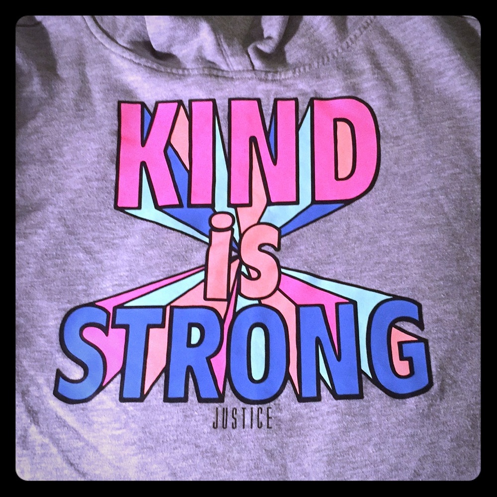 A justice shirt/hoodie with a hood